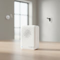 TP-Link Tapo H100 smart hub with chime placed in modern home interior