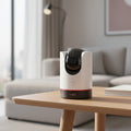 TP-Link Tapo C225 pan tilt AI security camera mounted indoors on shelf