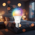 Tapo L535E RGB smart light bulb installed in ceiling lamp with colorful ambient lighting