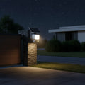 TP-Link Tapo C615F KIT solar floodlight pan tilt security camera installed outdoors at night