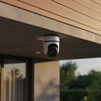 TP-Link Tapo C510W outdoor pan tilt security camera mounted under roof eave