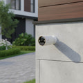 P-Link Tapo C460 battery powered 4K outdoor security camera installed on house exterior wall