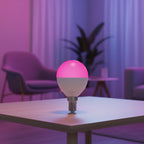 TP-Link Tapo L430P smart multicolor LED bulb glowing in bedroom lamp
