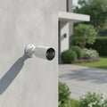TP-Link Tapo C402 wire-free indoor outdoor security camera mounted on house exterior wall