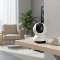 TP-Link Tapo C220 2K pan tilt AI security camera mounted indoors on shelf