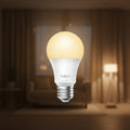 Tapo L510E smart bulb controlled via mobile app adjusting brightness levels