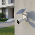 TP-Link Tapo C402 KIT solar powered security camera installed outdoors on house wall