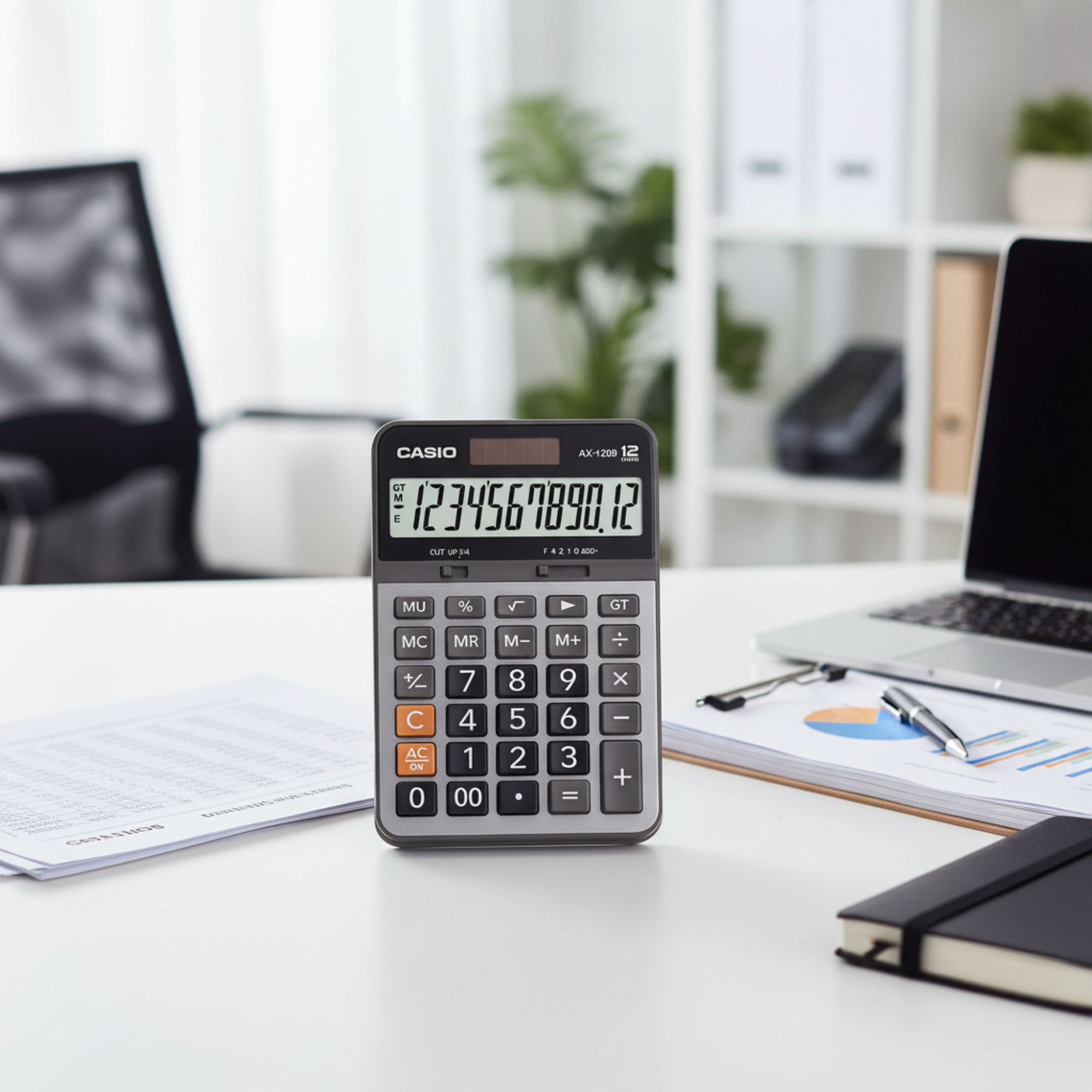 Casio AX-120B compact desk calculator on a professional office desk.