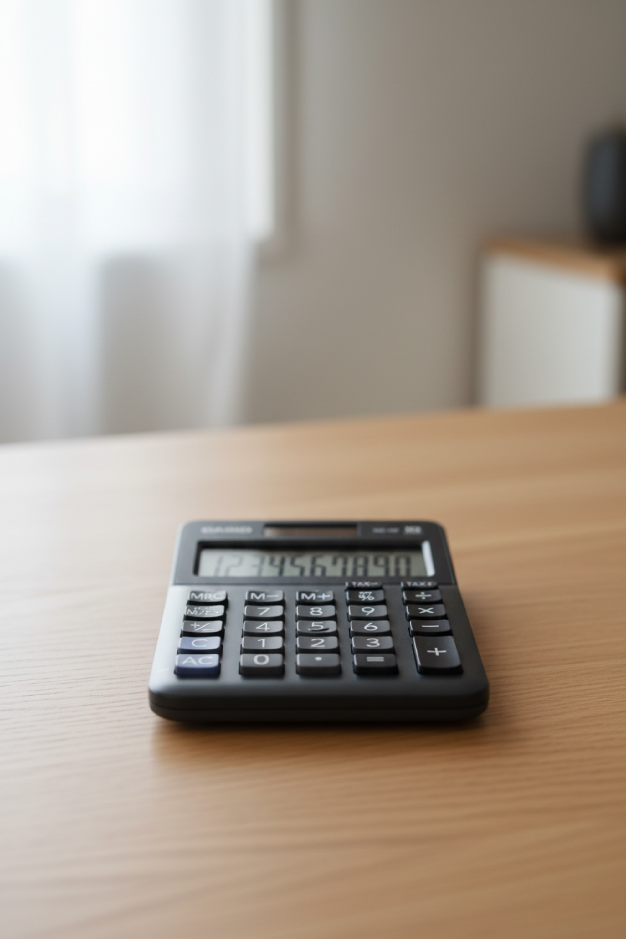 Casio MS-10F on a real wooden table.