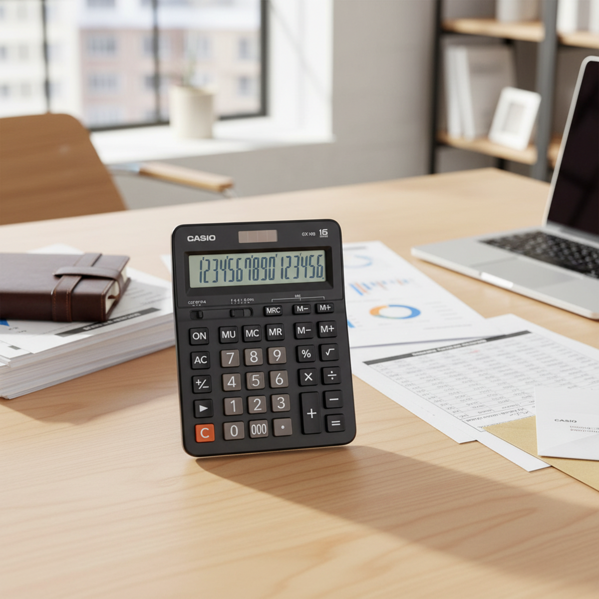 Casio GX-16B desktop calculator on a professional office desk.