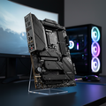 MSI Z790 motherboard placed on a gaming desk with a blurred RGB gaming setup behind it.