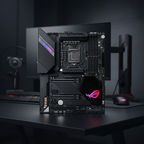 ASUS ROG Maximus XII Hero Wi-Fi motherboard standing upright on a gaming desk in a real workspace.