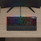 Top-down view of ASUS TUF Gaming K3 keyboard on a real gaming desk with RGB lighting.

Red Switch Brown Tactile